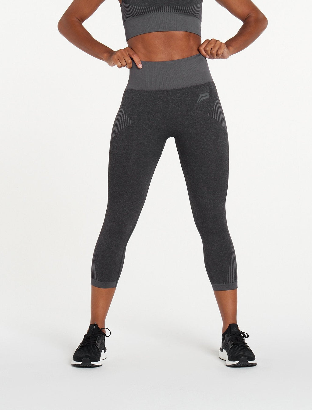 products/womens-adapt-seamless-34-leggings-black_charcoal.jpg