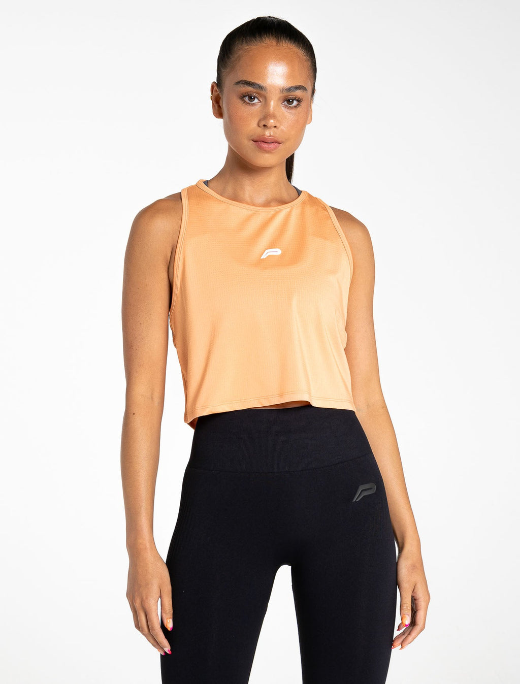 products/womens-breeze-crop-tank-coral.jpg